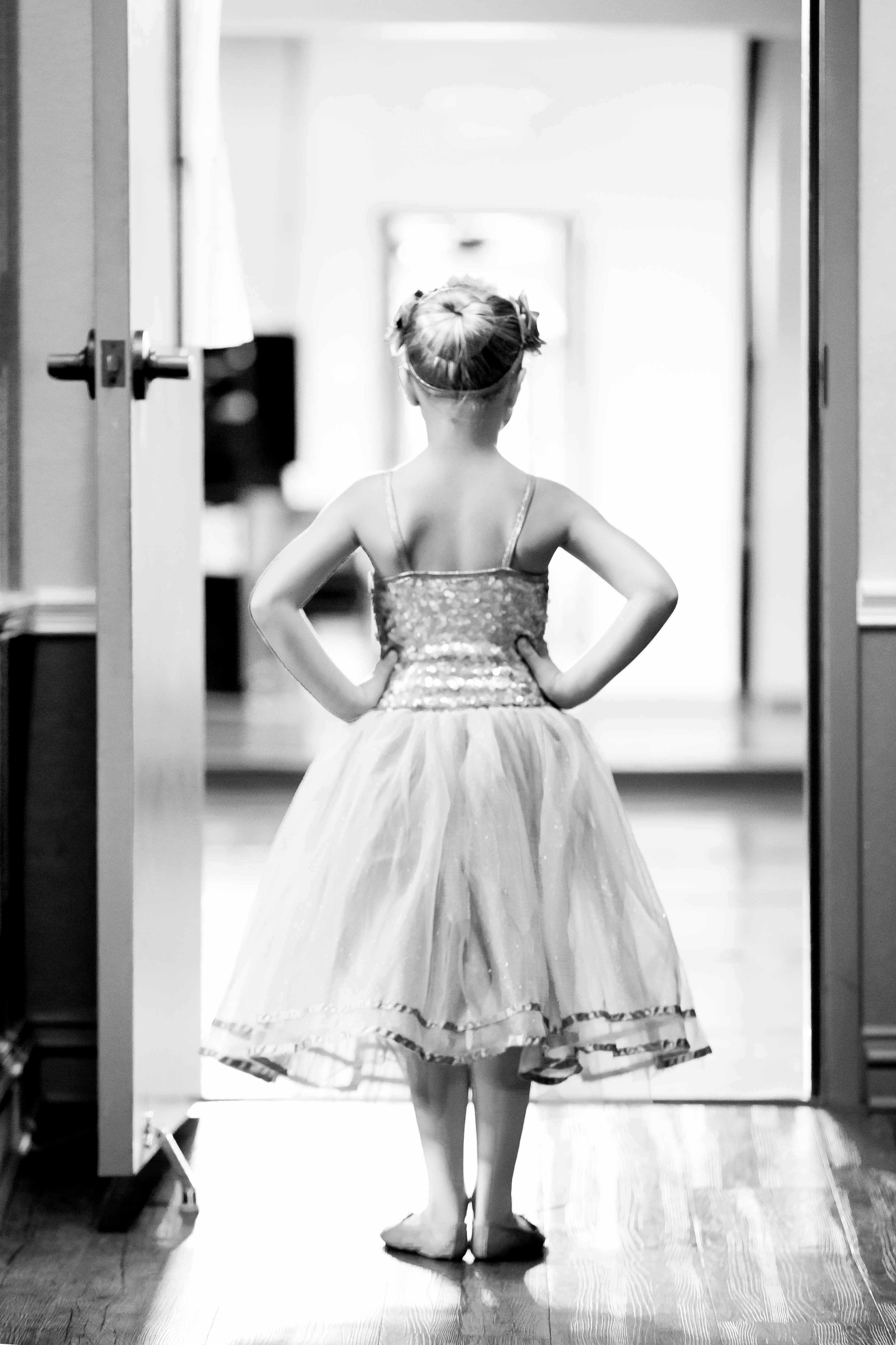 tiny dancer posed in doorway